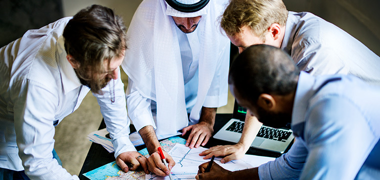 How does cultural understanding play a role in conducting a business feasibility study in Qatar?